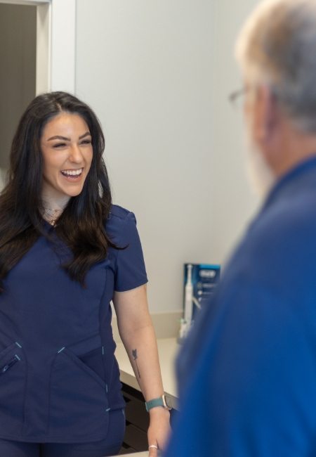 Sachse dental team member smiling at a patient
