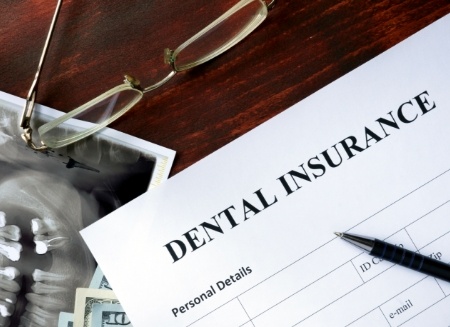 Dental insurance paperwork on desk