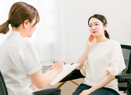 Patient and dentist discussing TMD