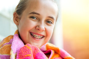 Girl smiling with braces