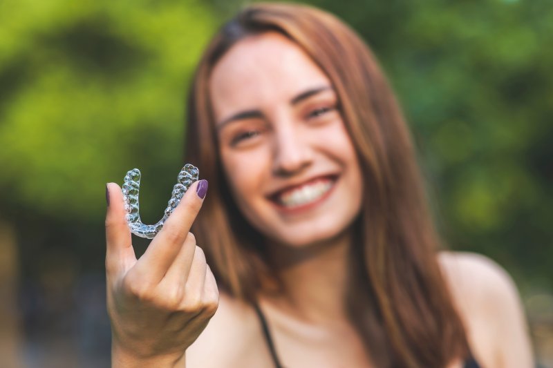 woman smiling about Invisalign tips in Sachse