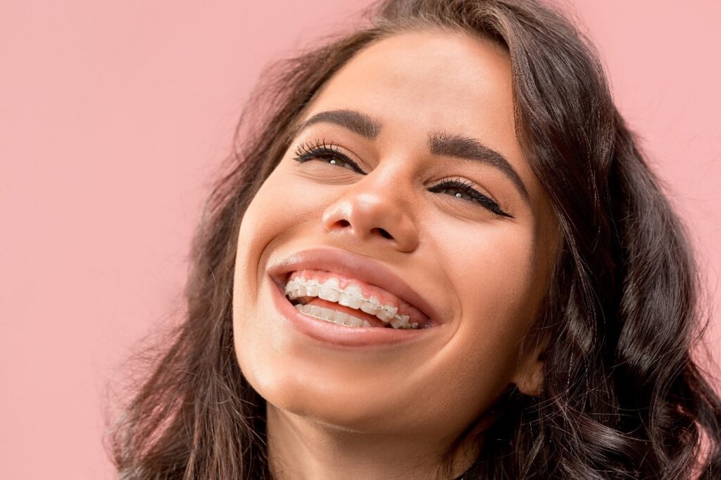 smiling adult with braces 